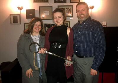 Natalie Nelson and parents at an escape room