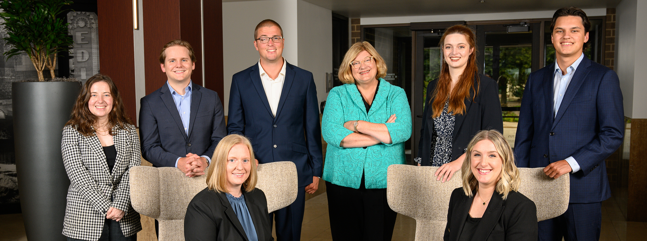 Laurel Wealth Planning team of financial advisors and client service staff outside their office building