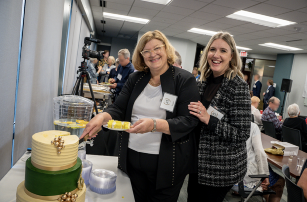 Cake Cutting and a Toast to 25 Years 